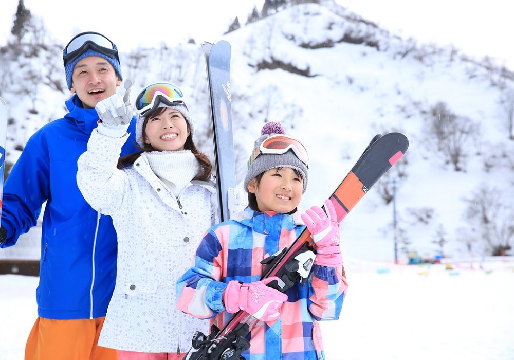 Family having fun skiing