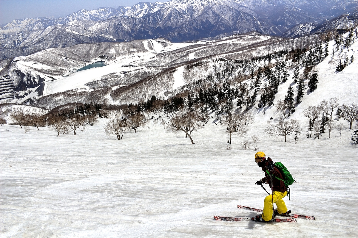 Skiers going down the slopes of Kagura Ski Resort