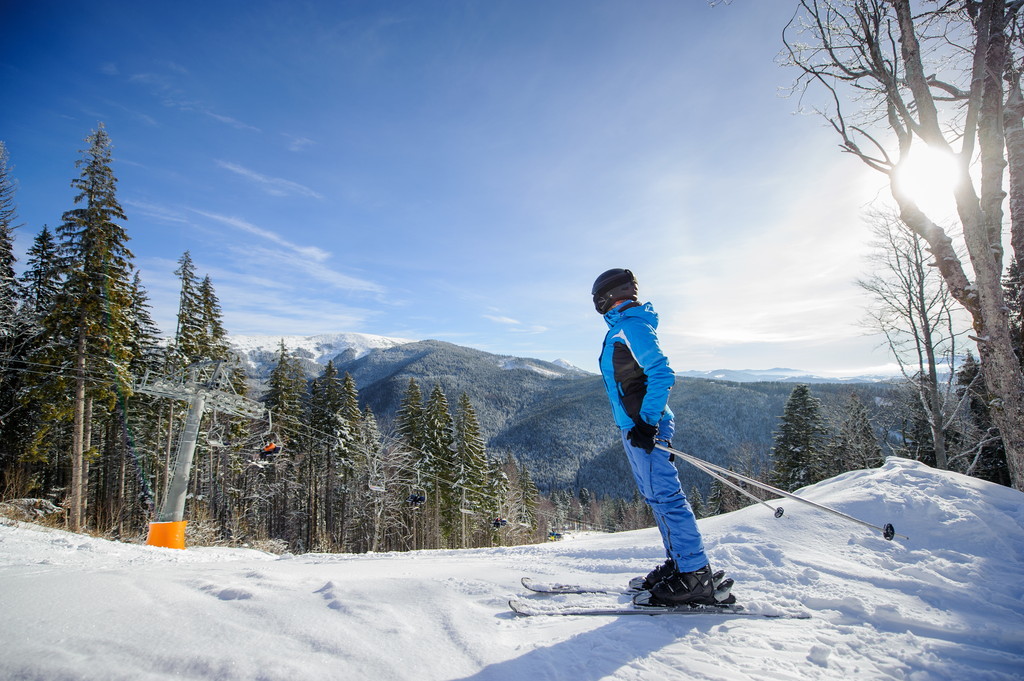 A skier by the mountain