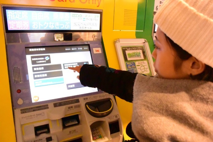 Buying tickets from the ticket machine